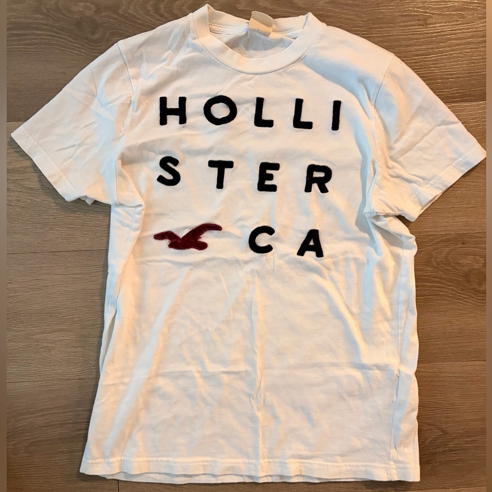 Hollister White Tee with Black Text and Red Logo
